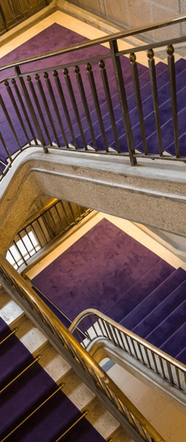 Escaliers de prestige avec rampe en bronze