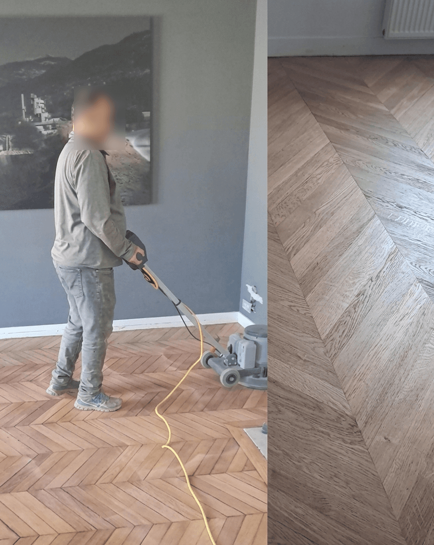 Artisan ponçant un parquet à la ponceuse à bande